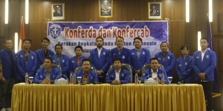 Ketua GAMKI Kalteng, Yudhi Karlianto Manan foto bersama usai Konferda dan Konfercab, Sabtu (24/05/2025).